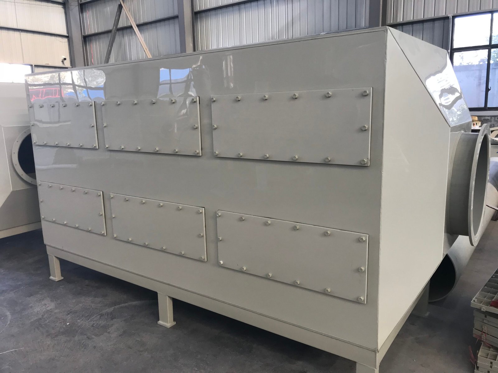 Drawer type activated carbon adsorption box with side-access carbon trays for VOC and odor control